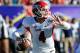 Fresno State quarterback Derek Carr looks to throw the ball against Southern California during the second quarter of the Royal Purple Bowl NCAA college football game, Saturday, Dec. 21, 2013, in Las Vegas. (AP Photo/David Cleveland)