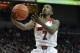Louisville's Russ Smith goes in for a layup during the second half of an NCAA college basketball game Thursday, Jan. 16, 2014, in Louisville, Ky. Louisville defeated Houston 91-52. (AP Photo/Timothy D. Easley)