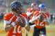 South Squad quarterback Jimmy Garoppolo of Eastern Illinois (10), left, drops back with fellow quarterbacks Derek Carr of Fresno State (4), middle, and David Fales of San Jose State (12), right, during Senior Bowl practice at Fairhope Municipal Stadium, Monday, Jan. 20, 2014 in Fairhope, Ala. (AP Photo/G.M. Andrews)