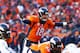 DENVER, CO - JANUARY 12: Peyton Manning #18 of the Denver Broncos calls a play against the San Diego Chargers during the AFC Divisional Playoff Game at Sports Authority Field at Mile High on January 12, 2014 in Denver, Colorado. (Photo by Doug Pensinger/Getty Images)