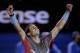 Rafael Nadal of Spain celebrates after defeating Roger Federer of Switzerland during their semifinal at the Australian Open tennis championship in Melbourne, Australia, Friday, Jan. 24, 2014.(AP Photo/Rick Rycroft)