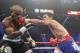 Manny Pacquiao, from the Philippines, right, lands a left to the head of Timothy Bradley, from Palm Springs, Calif., in their WBO world welterweight title fight Saturday, June 9, 2012, in Las Vegas. (AP Photo/Chris Carlson)