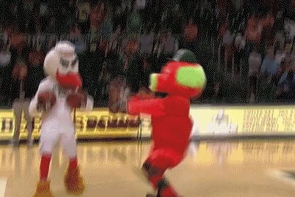 Video: Miami (FL) Mascot Hits Behind-the-Back Halfcourt Shot