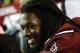 South Carolina defensive end Jadeveon Clowney smiles as he sits on the bench during the first half of an NCAA college football game against Kentucky, Saturday, Oct. 5, 2013, in Columbia, S.C. (AP Photo/Rainier Ehrhardt)