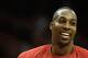 HOUSTON, TX - JANUARY 24: Dwight Howard #12 of the Houston Rockets waits on the court before the game against the Memphis Grizzlies at the Toyota Center on January 24, 2014 in Houston, Texas. NOTE TO USER: User expressly acknowledges and agrees that, by downloading and or using this photograph, User is consenting to the terms and conditions of the Getty Images License Agreement. (Photo by Scott Halleran/Getty Images)