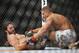 Jan 25, 2014; Chicago, IL, USA; Daron Cruickshank (red gloves) fights Mike Rio (blue gloves) during UFC on FOX 10 at the United Center. Mandatory Credit: David Banks-USA TODAY Sports