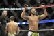 Jan 25, 2014; Chicago, IL, USA; Benson Henderson (red gloves) reacts after defeating Josh Thomson (blue gloves) during UFC on FOX 10 at the United Center. Mandatory Credit: David Banks-USA TODAY Sports