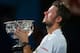 MELBOURNE, AUSTRALIA - JANUARY 26: Stanislas Wawrinka of Switzerland holds the Norman Brookes Challenge Cup after winning his men's final match against Rafael Nadal of Spain during day 14 of the 2014 Australian Open at Melbourne Park on January 26, 2014 in Melbourne, Australia. (Photo by Scott Barbour/Getty Images)