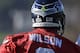 Seattle Seahawks quarterback Russell Wilson's helmet bears a logo for Super Bowl XLVIII before NFL football practice, Thursday, Jan. 23, 2014, in Renton, Wash. The Seahawks play the Denver Broncos on Feb. in the Super Bowl. (AP Photo/Ted S. Warren)