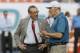Miami Dolphins owner Stephen Ross, left, speaks with head coach Joe Philbin before an NFL football game against the San Diego Chargers, Sunday, Nov. 17, 2013, in Miami Gardens, Fla. (AP Photo/Wilfredo Lee)