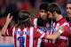 MADRID, SPAIN - DECEMBER 21: Diego Costa (2ndL) of Atletico de Madrid celebrates scoring their second goal with teammates Filipe Luis (L), Diego Godin (R) and Adrian Lopez (2ndR) during the La Liga match between Club Atletico de Madrid and Levante UD at Vicente Calderon Stadium on December 21, 2013 in Madrid, Spain. (Photo by Gonzalo Arroyo Moreno/Getty Images)