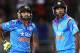 AUCKLAND, NEW ZEALAND - JANUARY 25: Ravindra Jadeja and Varun Aaron of India prepare for the last over during the One Day International match between New Zealand and India at Eden Park on January 25, 2014 in Auckland, New Zealand. (Photo by Anthony Au-Yeung/Getty Images)