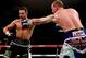 MANCHESTER, ENGLAND - NOVEMBER 23: Carl Froch (L) in action with George Groves during their IBF and WBA World Super Middleweight bout at Phones4u Arena on November 23, 2013 in Manchester, England. (Photo by Scott Heavey/Getty Images)