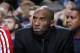 DALLAS, TX - JANUARY 7: Kobe Bryant #24 of the Los Angeles Lakers watches his team from the bench against the Dallas Mavericks on January 7, 2014 at the American Airlines Center in Dallas, Texas. NOTE TO USER: User expressly acknowledges and agrees that, by downloading and or using this photograph, User is consenting to the terms and conditions of the Getty Images License Agreement. Mandatory Copyright Notice: Copyright 2014 NBAE (Photo by Glenn James/NBAE via Getty Images)