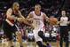 Jan 20, 2014; Houston, TX, USA; Houston Rockets small forward Chandler Parsons (25) drives during the second quarter as Portland Trail Blazers small forward Nicolas Batum (88) defends at Toyota Center. Mandatory Credit: Troy Taormina-USA TODAY Sports
