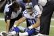 Dallas Cowboys linebacker Sean Lee is attended to after suffering a concussion against the Washington Redskins during the first half of an NFL football game, Sunday, Dec. 19, 2010 in Arlington, Texas. (AP Photo/Sharon Ellman)