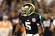 Jan 7, 2013; Miami, FL, USA; Notre Dame Fighting Irish quarterback Everett Golson (5) scrambles against the Alabama Crimson Tide during the 2013 BCS Championship game at Sun Life Stadium. Alabama won 42-14. Mandatory Credit: Matthew Emmons-USA TODAY Sports