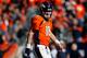 DENVER, CO - JANUARY 19: Peyton Manning #18 of the Denver Broncos looks on against the New England Patriots during the AFC Championship game at Sports Authority Field at Mile High on January 19, 2014 in Denver, Colorado. (Photo by Kevin C. Cox/Getty Images)