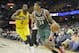 Milwaukee Bucks' Giannis Antetokounmpo (34), from Greece, drives past Cleveland Cavaliers' C.J. Miles (0) in an NBA basketball game Friday, Jan. 24, 2014, in Cleveland. (AP Photo/Mark Duncan)