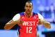 Feb 17, 2013; Houston, TX, USA; Western Conference center Dwight Howard (12) of the Los Angeles Lakers reacts in the third quarter of the 2013 NBA all star game at the Toyota Center. Mandatory Credit: Bob Donnan-USA TODAY Sports