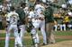 OAKLAND, CA - SEPTEMBER 05: Brandon McCarthy #32 of the Oakland Athletics is taken out of the game by trainer Nick Paparesta (R) and manager Bob Melvin (2nd L) after McCarthy was hit in the head with a line drive off the bat of Erick Aybar #2 of the Los Angeles Angels of Anaheim in the fourth inning at O.co Coliseum on September 5, 2012 in Oakland, California. Cliff Pennington #2 and Derek Norris #36 look on. (Photo by Thearon W. Henderson/Getty Images)