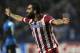 Atletico's Arda Turan celebrates after scoring his side's second goal during the Champions League group G soccer match between FC Porto and Atletico de Madrid Tuesday, Oct. 1, 2013, at the Dragao stadium in Porto, northern Portugal. Atletico won 2-1. (AP Photo/Paulo Duarte)