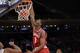 Indiana's Noah Vonleh, center, dunks the ball during the second half of an NCAA college basketball game against Washington Thursday, Nov. 21, 2013, in New York. Indiana beat Washington 102-84. (AP Photo/Seth Wenig)