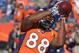 Denver Broncos wide receiver Demaryius Thomas (88) catches a pass during warmups before playing against the San Diego Chargers in an NFL AFC division playoff football game, Sunday, Jan. 12, 2014, in Denver. (AP Photo/Jack Dempsey)