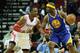 HOUSTON, TX - DECEMBER 06: Jermaine O'Neal #7 of the Golden State Warriors drives against Dwight Howard #12 of the Houston Rockets during the game at Toyota Center on December 6, 2013 in Houston, Texas. NOTE TO USER: User expressly acknowledges and agrees that, by downloading and or using this photograph, User is consenting to the terms and conditions of the Getty Images License Agreement. (Photo by Scott Halleran/Getty Images)