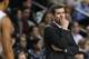 Boston Celtics head coach Brad Stevens looks toward his players during the second half of an NBA basketball game against the Los Angeles Lakers in Boston, Friday, Jan. 17, 2014. The Lakers defeated the Celtics 107-104. (AP Photo/Charles Krupa)