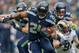 SEATTLE, WA - DECEMBER 29: Running back Marshawn Lynch #24 of the Seattle Seahawks rushes against the St. Louis Rams at CenturyLink Field on December 29, 2013 in Seattle, Washington. (Photo by Otto Greule Jr/Getty Images)