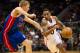 Nov 20, 2013; Atlanta, GA, USA; Atlanta Hawks guard Jeff Teague (0) is defended by Detroit Pistons forward Kyle Singler (25) during the third quarter at Philips Arena. The Hawks won 93-85. Mandatory Credit: Kevin Liles-USA TODAY Sports