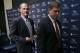 Tennessee Titans head coach Ken Whisenhunt, left, leaves a news conference with general manager Ruston Webster, right, Tuesday, Jan. 14, 2014, in Nashville, Tenn. The Titans introduced Whisenhunt Tuesday as their 17th head coach and only their third different coach since moving from Houston to Tennessee. (AP Photo/Mark Humphrey)