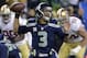 Seattle Seahawks' Russell Wilson throws during the second half of the NFL football NFC Championship game against the San Francisco 49ers, Sunday, Jan. 19, 2014, in Seattle. (AP Photo/Ted S. Warren)