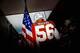 DALLAS, TX - OCTOBER 12: Drew Russo #56 of the Texas Longhorns carries an American flag as he takes the field against the Oklahoma Sooners at the Cotton Bowl on October 12, 2013 in Dallas, Texas. (Photo by Tom Pennington/Getty Images)