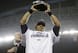 Seattle Seahawks' Russell Wilson holds up George Halas Trophy after the NFL football NFC Championship game against the San Francisco 49ers Sunday, Jan. 19, 2014, in Seattle. The Seahawks won 23-17 to advance to Super Bowl XLVIII. (AP Photo/Matt Slocum)
