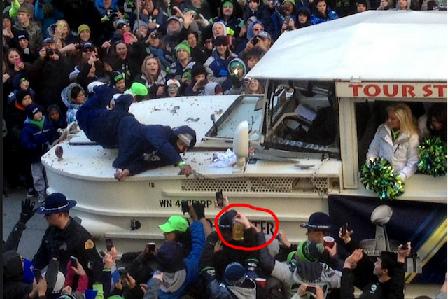Marshawn Lynch Grabs Bottle of Fireball During Seahawks' Super Bowl Parade