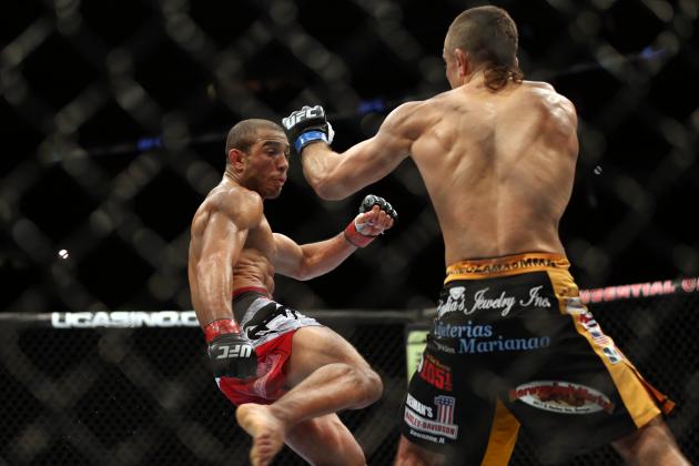 Jose Aldo whips a leg kick at Ricardo Lamas during their UFC 169 ...