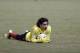 Mexico's goalkeeper Guillermo Ochoa lies on the pitch during a training session ahead of a 2014 World Cup qualifying soccer match against Costa Rica, in San Jose, Costa Rica, Monday, Oct. 14, 2013. (AP Photo/Moises Castillo)