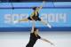 Marissa Castelli and Simon Shnapir of the United States compete in the team pairs short program figure skating competition at the Iceberg Skating Palace during the 2014 Winter Olympics, Thursday, Feb. 6, 2014, in Sochi, Russia. (AP Photo/Vadim Ghirda)