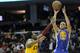 Dec 29, 2013; Cleveland, OH, USA; Golden State Warriors point guard Stephen Curry (30) shoots against Cleveland Cavaliers point guard Kyrie Irving (2) in the first quarter at Quicken Loans Arena. Mandatory Credit: David Richard-USA TODAY Sports