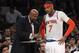 New York Knicks head coach Mike Woodson, left, gives Carmelo Anthony instruction in the second half of Game 2 of their NBA basketball playoff series in the Eastern Conference semifinals against the Indiana Pacers at Madison Square Garden in New York, Tuesday, May 7, 2013. The Knicks won 105-79. (AP Photo/Mary Altaffer)
