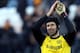 Chelsea's goalkeeper Petr Cech celebrates at the end of their English Premier League soccer match against Hull City at the KC Stadium, Hull, England, Saturday, Jan. 11, 2014. (AP Photo/Scott Heppell)