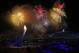 Fireworks are seen over the Olympic Cauldron during the opening ceremony of the 2014 Winter Olympics in Sochi, Russia, Friday, Feb. 7, 2014. (AP Photo/Julio Cortez)