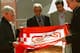 The President of Formula One Management, Bernie Eccleston, left, and the president of the Catalonian Automobile Club RACC, Sebastian Salvadore, 2nd left unviel a plaque in honour of late F1 driver, Brazilian Ayrton Senna in commemoration of the10th anniversary of his death, at the Montmelo circuit on the outskirts of Barcelona, Spain, Saturday May 8, 2004. The Spanish Grand Prix takes place Sunday. Others unideintified. (AP Photo/Bernat Armangue)