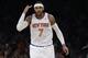 New York Knicks' Carmelo Anthony gestures after making a 3-point basket during the first half of an NBA basketball game against the Denver Nuggets on Friday, Feb. 7, 2014, in New York. The Knicks won 117-90. (AP Photo/Frank Franklin II)