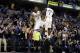 Indiana Pacers' Paul George (24) and Lance Stephenson celebrate after George hit a 3-pointer during the second half of an NBA basketball game against the New Orleans Hornets, Wednesday, Nov. 21, 2012, in Indianapolis. The Pacers won 115-107 in overtime. (AP Photo/Darron Cummings)