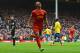 LIVERPOOL, ENGLAND - FEBRUARY 08: Raheem Sterling of Liverpool celebrates scoring the fifth goal during the Barclays Premier League match between Liverpool and Arsenal at Anfield on February 8, 2014 in Liverpool, England. (Photo by Michael Regan/Getty Images)