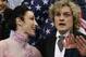 Meryl Davis and Charlie White of the United States wait for their results after competing in the team ice dance short dance figure skating competition at the Iceberg Skating Palace during the 2014 Winter Olympics, Saturday, Feb. 8, 2014, in Sochi, Russia. (AP Photo/Darron Cummings, Pool)