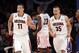Arizona's Aaron Gordon (11) and Kaleb Tarczewski (35) react after a basket by Rondae Hollis-Jefferson (23) against Duke during the second half of an NCAA college basketball game in the championship of the NIT Season Tip-off tournament Friday, Nov. 29, 2013, in New York. Arizona won 72-66. (AP Photo/Jason DeCrow)